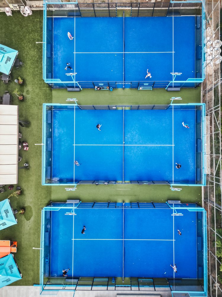 Aerial drone view of the courts by day