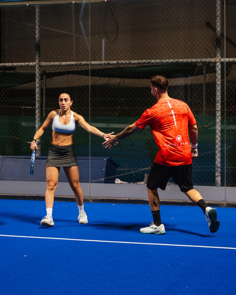 Doubles partners celebrating a point