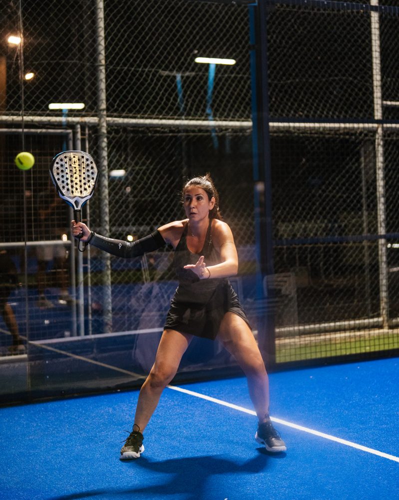 Player striking the ball mid-rally
